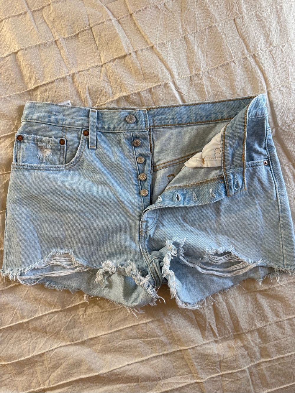Levi's Light Blue Distressed 501 shorts